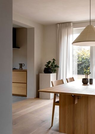 a scandi style idning room and kitchen