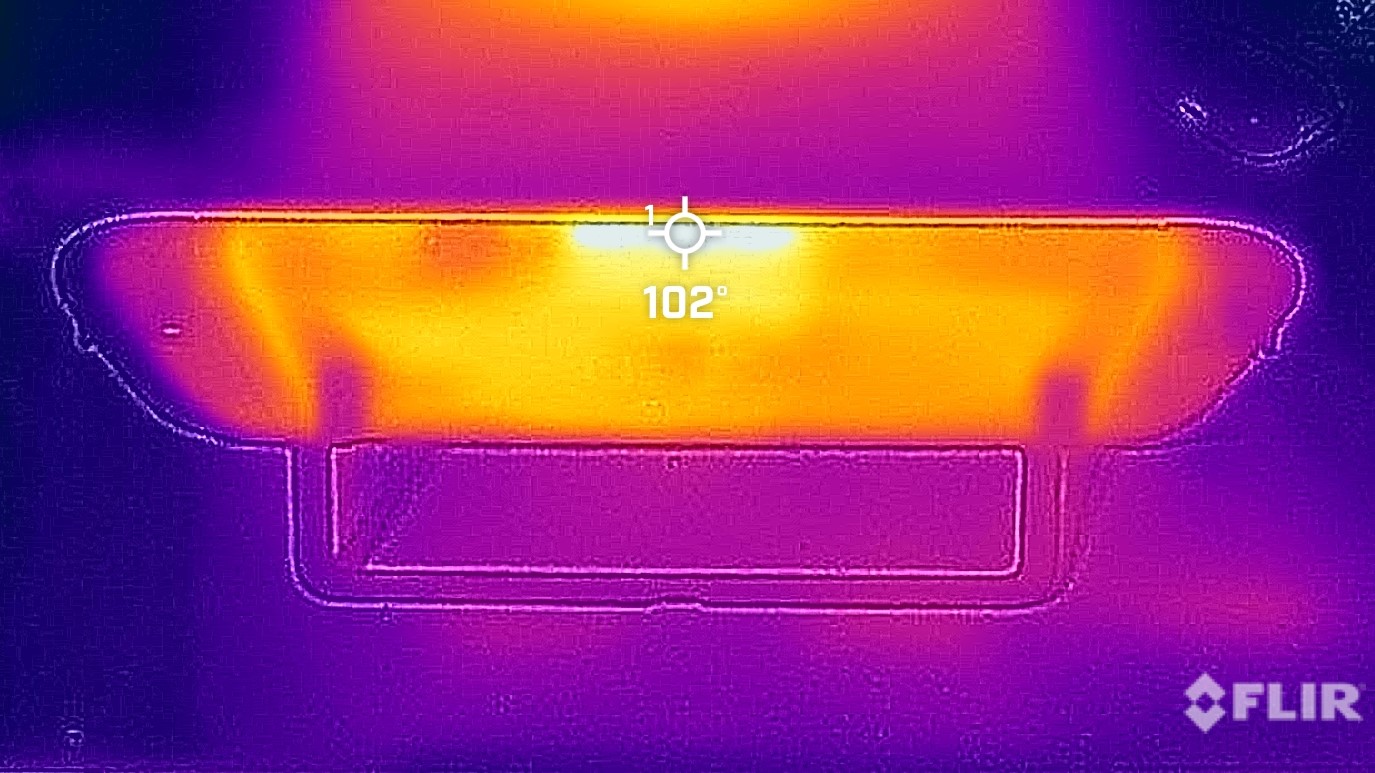 A thermal camera view of a Nintendo Switch 2 in portable mode, showing a peak temperature of 102 F at the exhaust vent