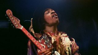 Jimi Hendrix performs onstage with The Jimi Hendrix Experience at London's Royal Albert Hall, February 18, 1969.