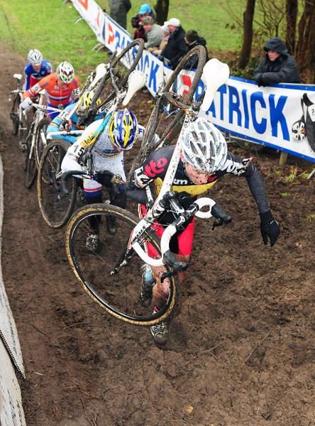 Riders run the steep run-up.