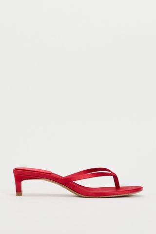 Red kitten-heel thong sandals