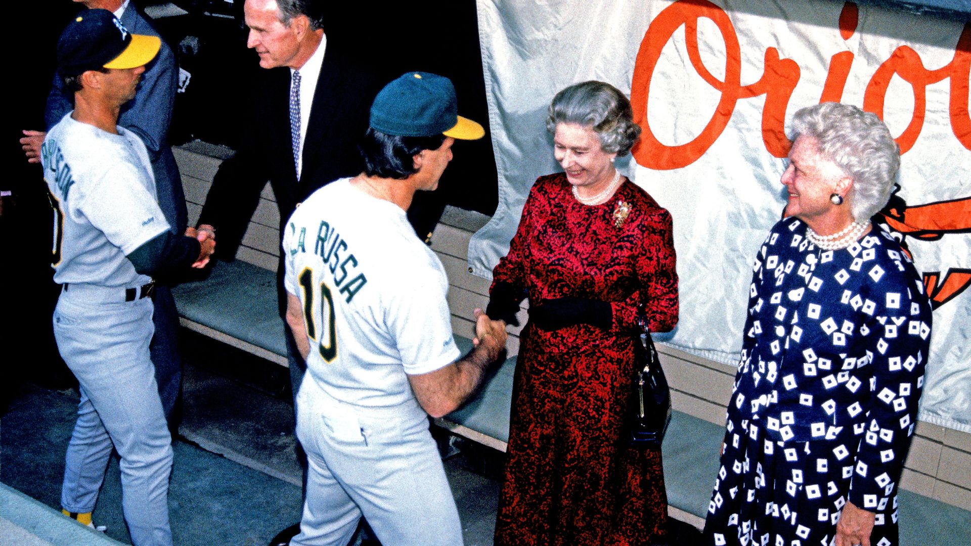 Queen Elizabeth II greets baseball players