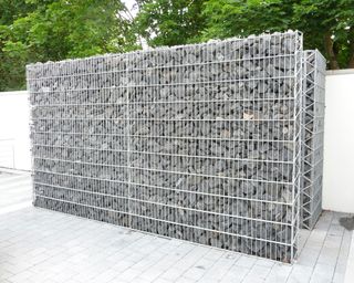 gabion filled walls to create a bin store