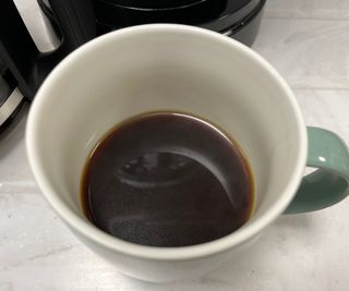 KitchenAid Drip Coffee Maker coffee in a mug on the countertop