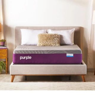 Purple Restore Cool Touch Hybrid Mattress on a bed.
