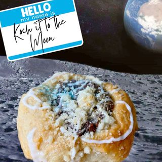 close-up of a pastry with the surface of the moon in the backgound