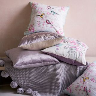 butterfly and bird printed cushion with velvet texture