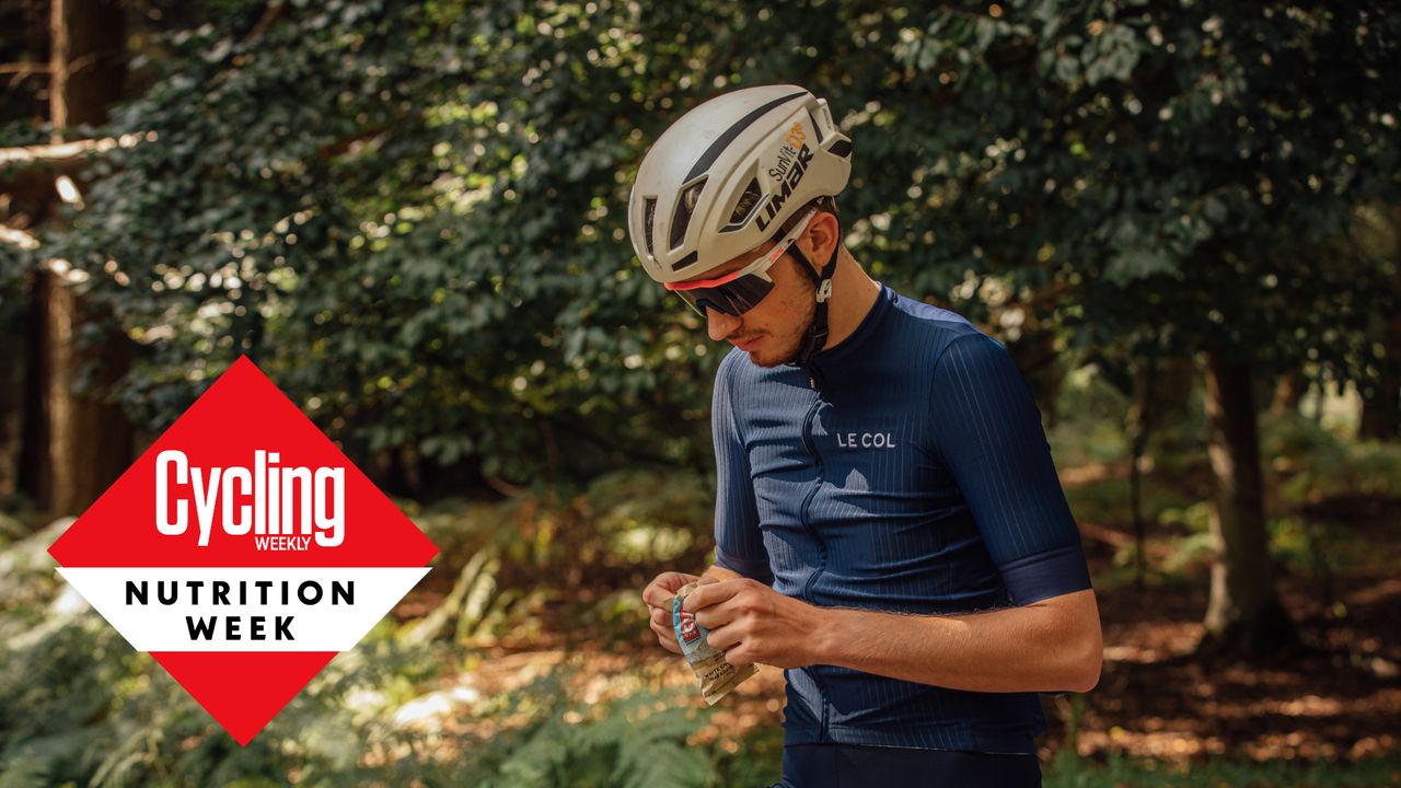 Male cyclist eating an energy bar during an endurance bike ride