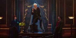 Dick Van Dyke dancing on a desk in Mary Poppins Returns