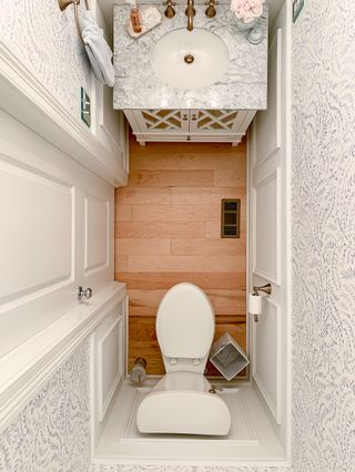 Above after shot of white bathroom wainscoting DIY