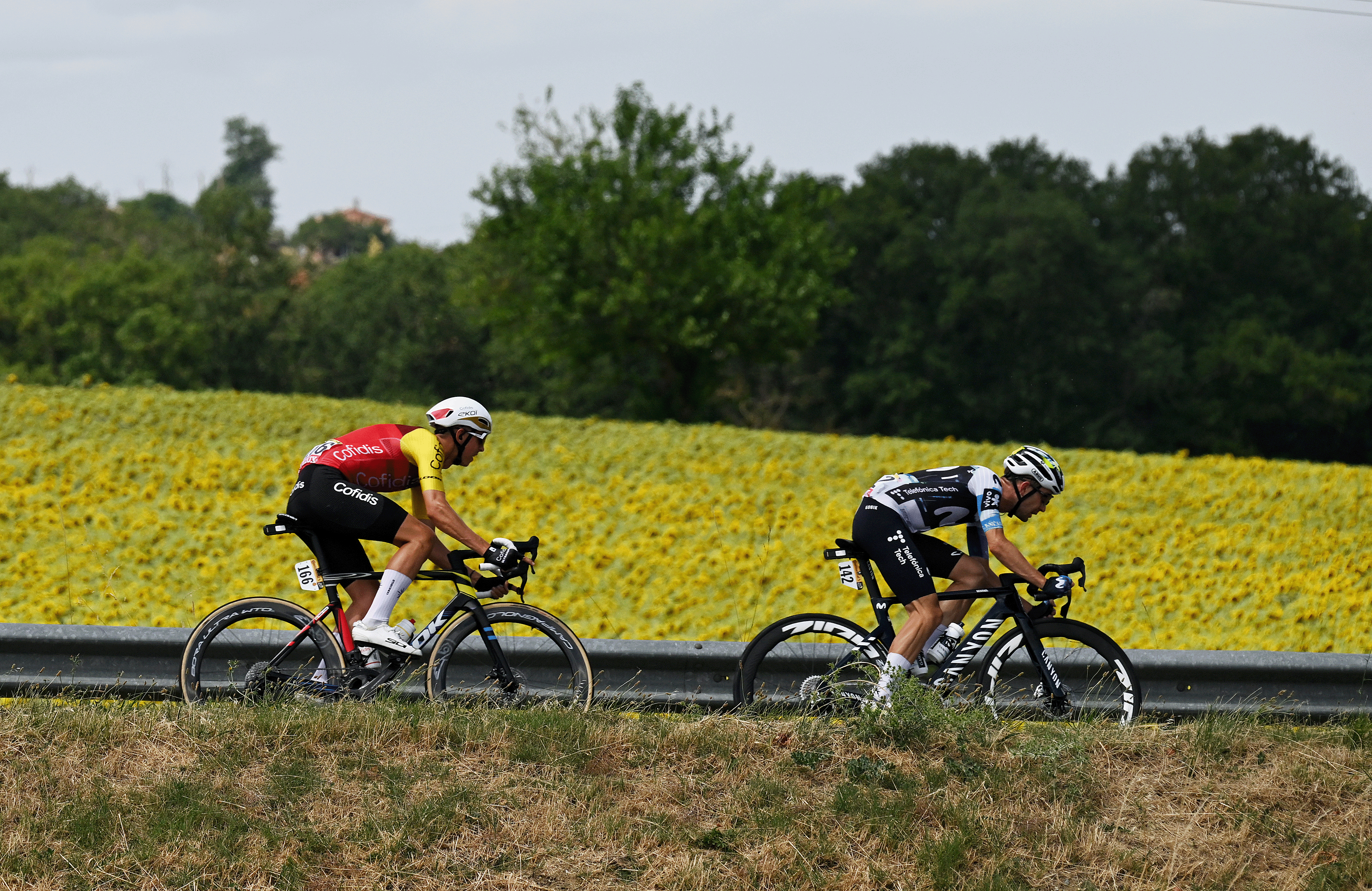 CARCASSONNE, FRANCE - JULY 20: (L-R) Raul Garcia Pierna of Spain and Team Arkea - B&B Hotels, Dylan Teuns of Belgium and Team Cofidis and Will Barta of The United States and Team Movistar compete during the 112th Tour de France 2025, Stage 15 a 169.3km stage from Muret to Carcassonne / #UCIWT / on July 20, 2025 in Carcassonne, France. (Photo by Tim de Waele/Getty Images)
