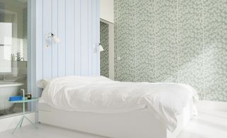 Master bedroom with bespoke furniture and a patterned wall