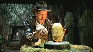 Indiana Jones replacing a golden idol with a bag of sand in Raiders of the Lost Ark