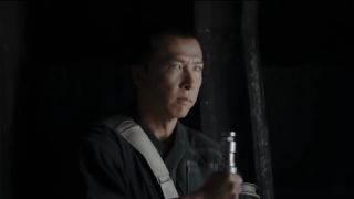 Donnie Yen holding a staff in Rogue One: A Star Wars Story