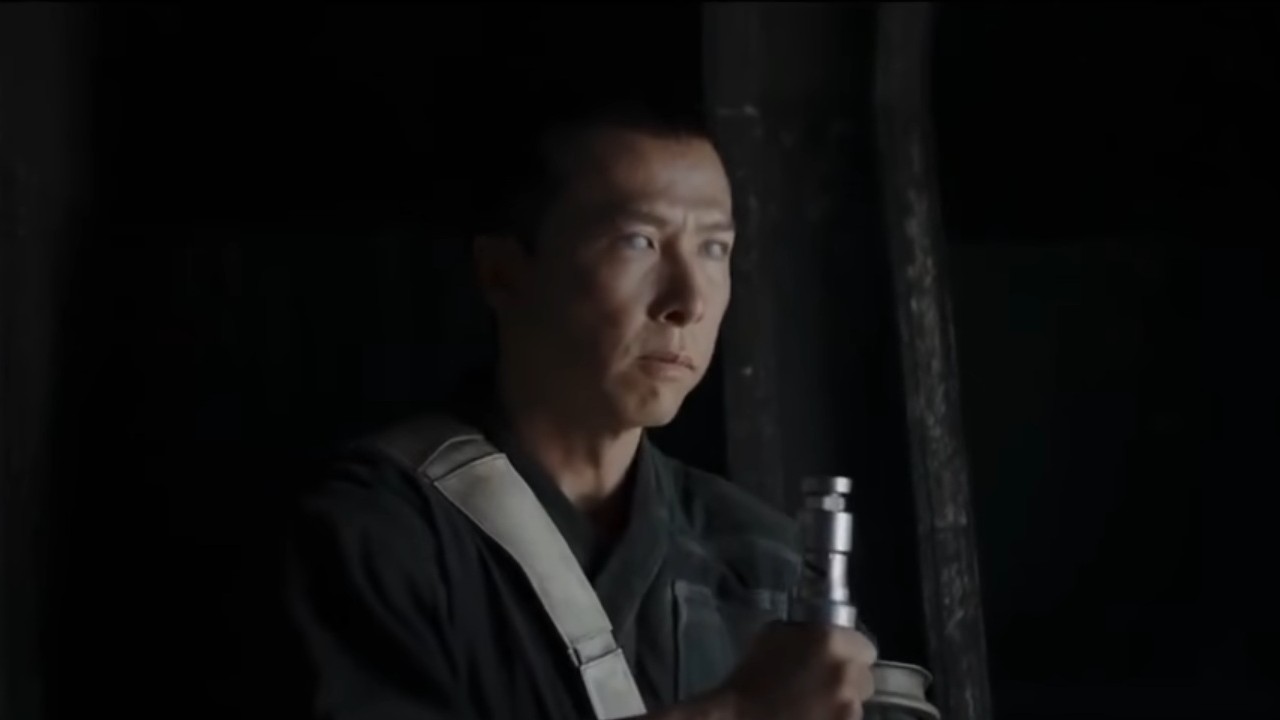 Donnie Yen holding a staff in Rogue One: A Star Wars Story