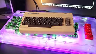 C64 Mini sitting on top of Commodore 64 Ultimate with purple RGB lighting enabled.