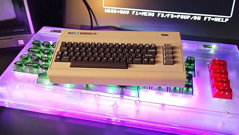 C64 Mini sitting on top of Commodore 64 Ultimate with purple RGB lighting enabled.