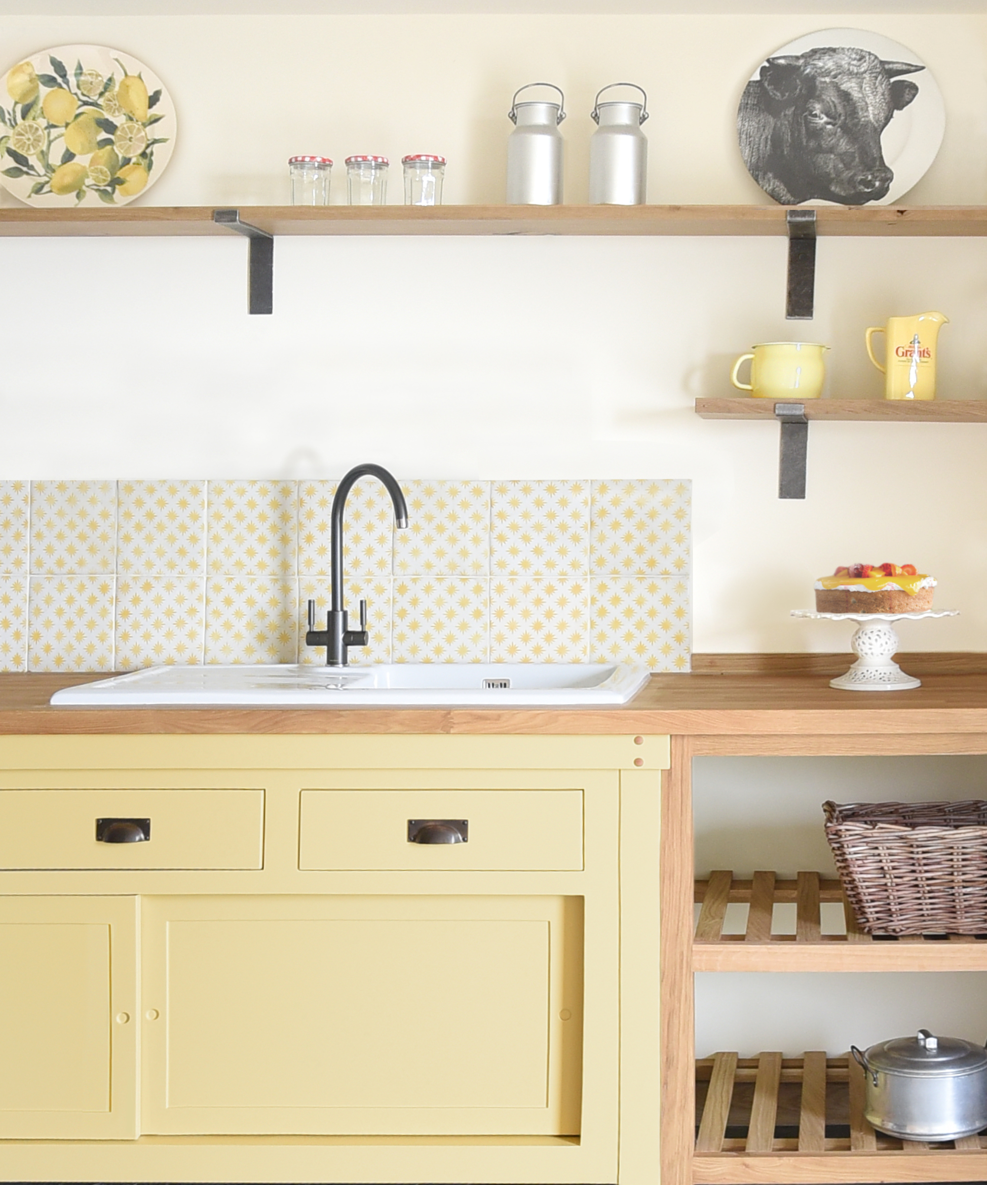 yellow kitchen unit housing sink