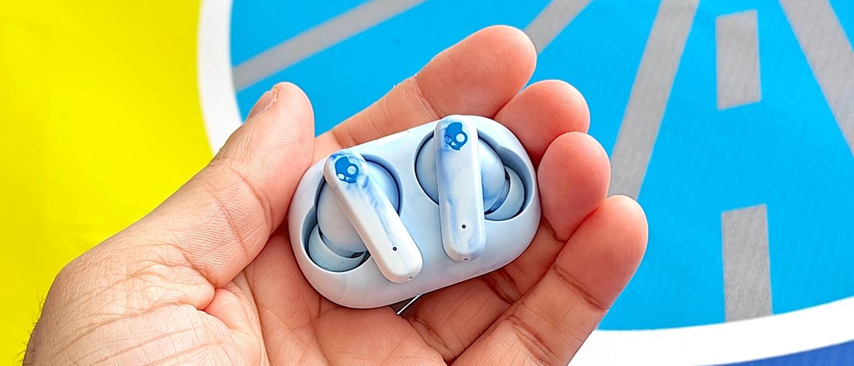 Skullcandy EcoBuds in light blue in charging case