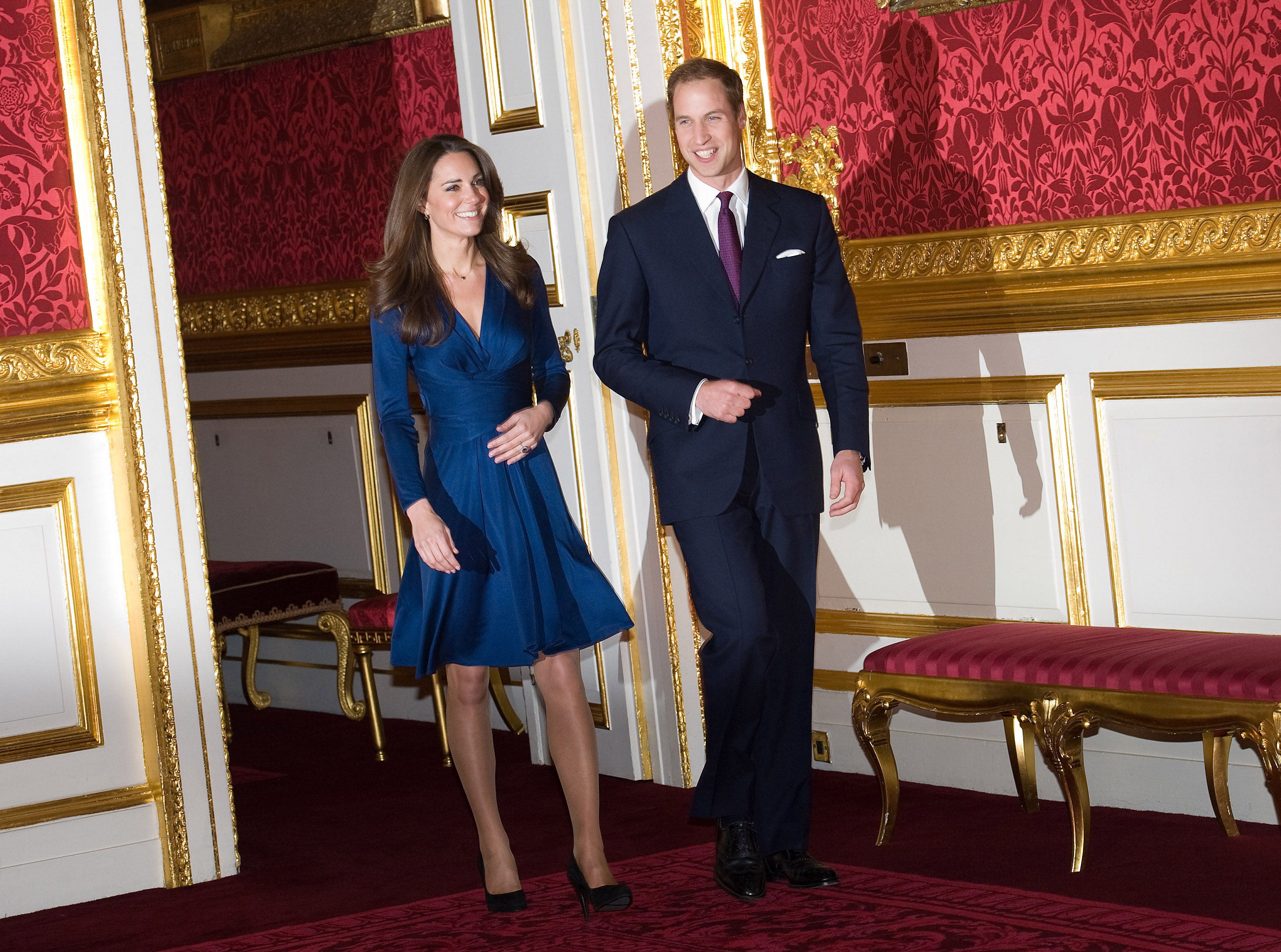 Kate Middleton and Prince William walking into the room at their engagement announcement