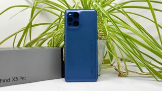 The back of the Oppo Find X3 Pro in blue.