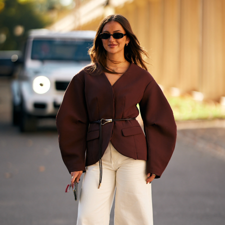 woman wearing a brown blazer 