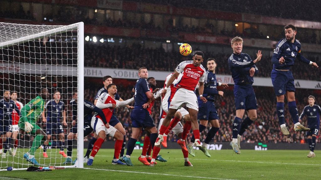 Jurrien Timber of Arsenal scores his team&#039;s first goal with a header as Andre Onana of Manchester United fails to make a save during the Premier League match between Arsenal FC and Manchester United FC at Emirates Stadium on December 04, 2024 in London, England.