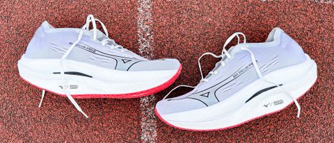 Mizuno Wave Rebellion Pro 2 on a running track outside