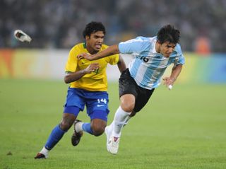 Sergio Aguero, right, won an Olympic gold medal with Argentina in 2008