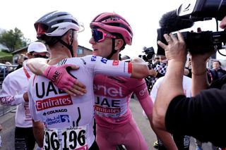 PRATI DI TIVO ITALY MAY 11 Stage winner Tadej Pogacar of Slovenia and UAE Team Emirates Pink Leader Jersey R celebrates the victory with his teammate Rafal Majka of Poland L after the 107th Giro dItalia 2024 Stage 8 a 152km stage from Spoleto to Prati di Tivo 1451m UCIWT on May 11 2024 in Prati di Tivo Italy Photo by Fabio Ferrari PoolGetty Images