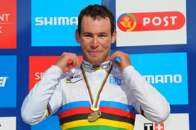 Mark Cavendish (Great Britain) adjusts his rainbow jersey