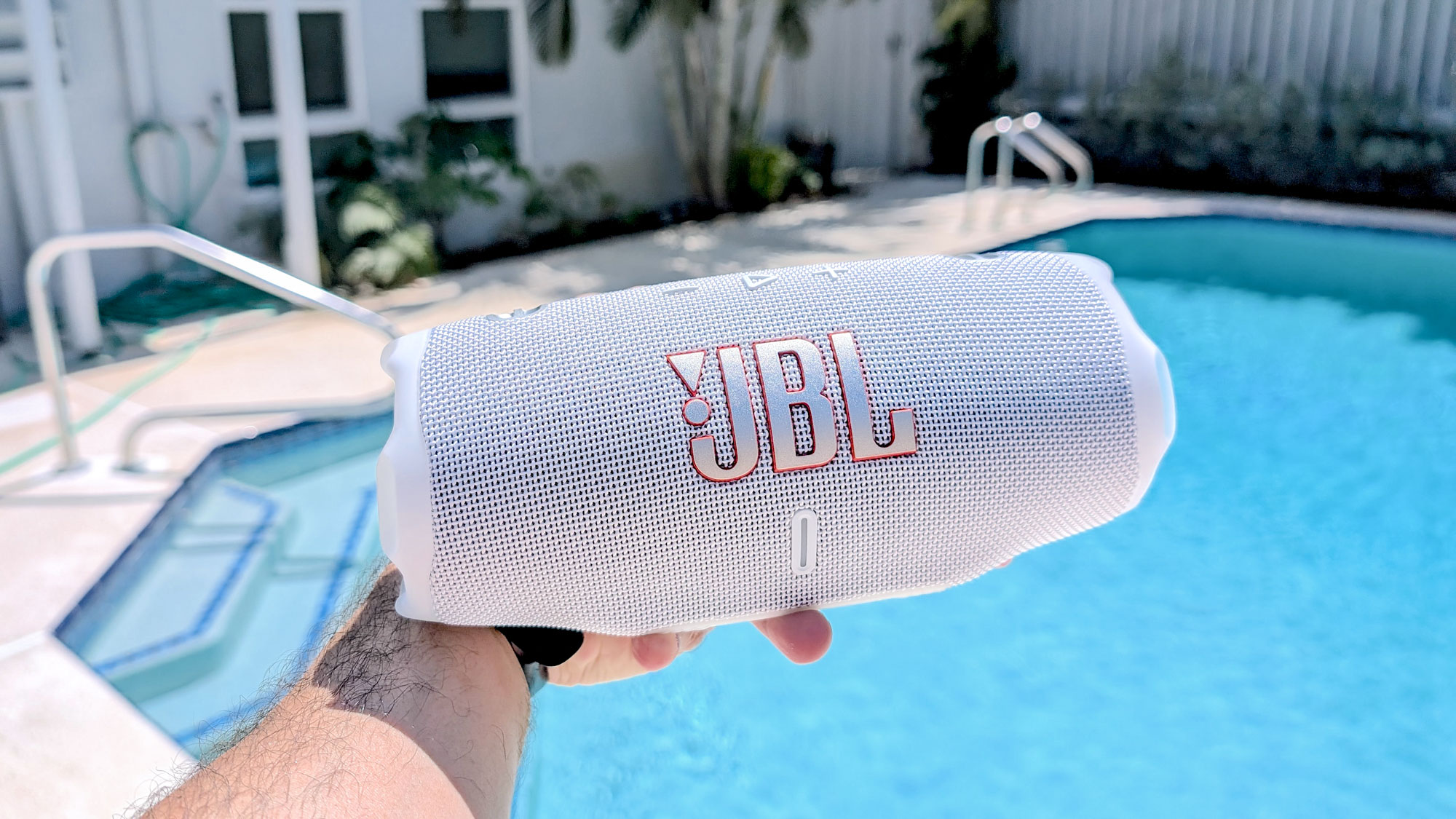 The JBL Charge 6 near the pool.