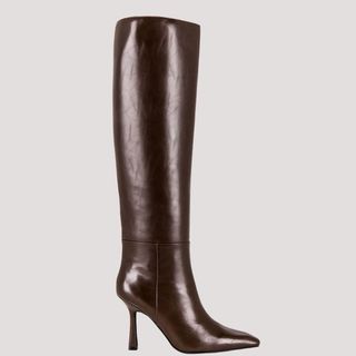 Flat lay image of brown leather boots