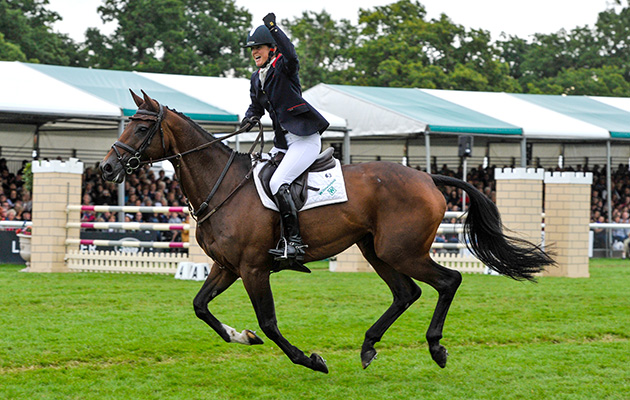 Piggy French soaks up the atmosphere after a clear showjumping round aboard Vanir Kamira, with her eventually taking the runner up spot