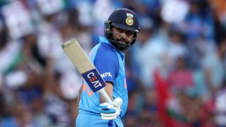 Rohit Sharma of India raises hit bat in celebration ahead of the IND vs AUS Cricket World Cup clash.
