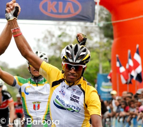 Race leader Nelson I. Sanchez (La Vega-Com.Nal.Energia) celebrates his overall victory at the conclusion of stage nine.