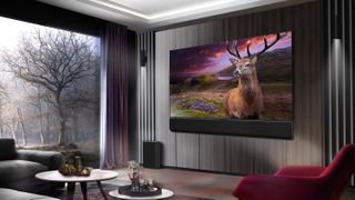 LG G3 OLED TV in a modern apartment living room with a deer on screen