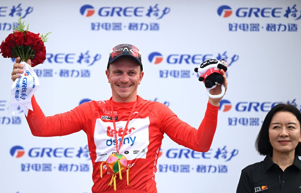FANGCHENGGANG CHINA OCTOBER 15 Lionel Taminiaux of Belgium and Team Lotto Dstny celebrates at podium as Red Leader Jersey winner during the 5th GreeTour Of Guangxi 2024 Stage 1 a 1493km stage from Fangchenggang to Fangchenggang UCIWT on October 15 2024 in Fangchenggang China Photo by Dario BelingheriGetty Images
