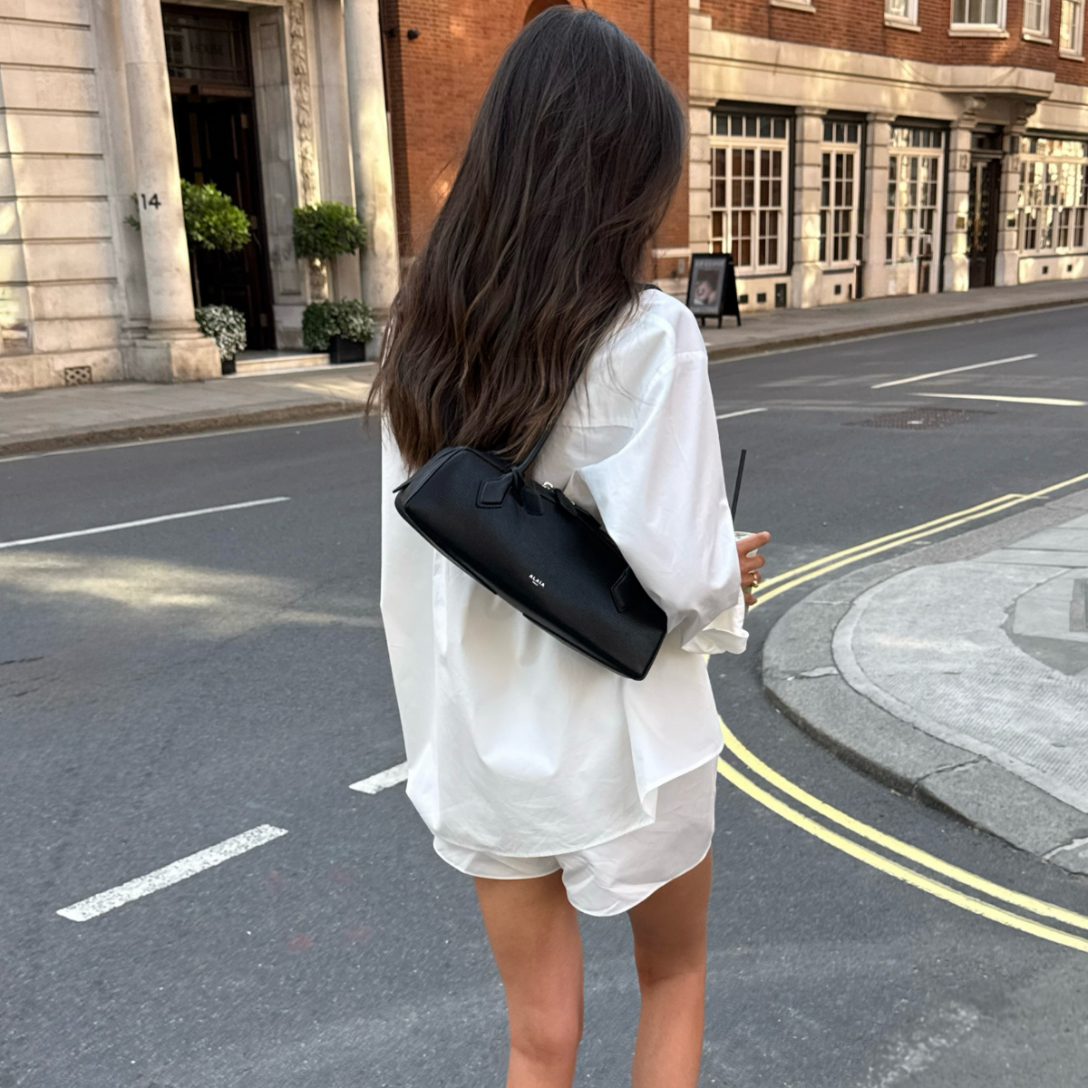 An image of a woman wearing all white outfit summer 2026