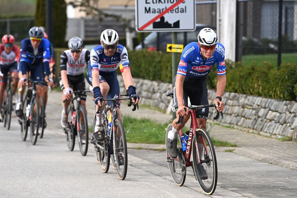HARELBEKE BELGIUM MARCH 24 LR Kasper Asgreen of Denmark and Team Soudal Quick Step and Mathieu Van Der Poel of The Netherlands and Team AlpecinDeceuninck compete during the 66th E3 Saxo Bank Classic Harelbeke 2023 a 2041km one day race from Harelbeke to Harelbeke on UCIWT March 24 2023 in Harelbeke Belgium Photo by Tim de WaeleGetty Images