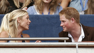Prince Harry talks to his girlfriend Chelsy Davy at the "Concert for Diana", held in memory of his mother Princess Diana, at Wembley Stadium in London, 01 July 2007