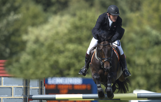 1-MAIN-Tim-Stockdale-looking-for-next-fence.jpg