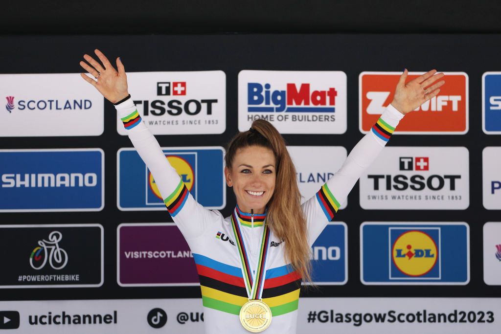 Pauline Ferrand-Prévot pulls on another rainbow jersey at the 2023 MTB Worlds