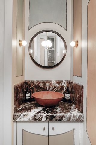 powder room with black marble countertop