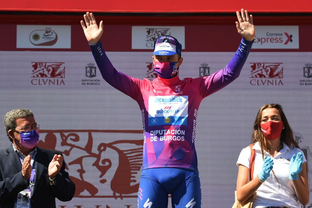 LAGUNAS DE NEILA SPAIN AUGUST 01 Podium Remco Evenepoel of Belgium and Team Deceuninck QuickStep Purple Leader Jersey Celebration during the 42nd Vuelta a Burgos 2020 Stage 5 a 158km stage from Covarrubias to Lagunas de Neila 1872m VueltaBurgos on August 01 2020 in Lagunas de Neila Spain Photo by David RamosGetty Images
