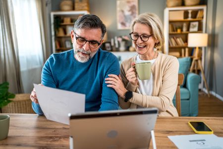 Mature couple managing house finances