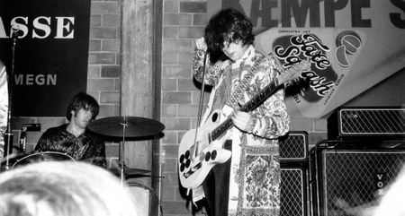 Jimmy Page uses a bow to play his "Mirror" Telecaster