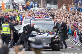 Thousands gathered outside Ibrox for the funeral procession of Fernando Ricksen