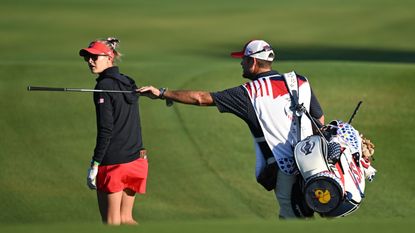 Nelly Korda with her caddie in a practice round prior to the Solheim Cup at Finca Cortesin