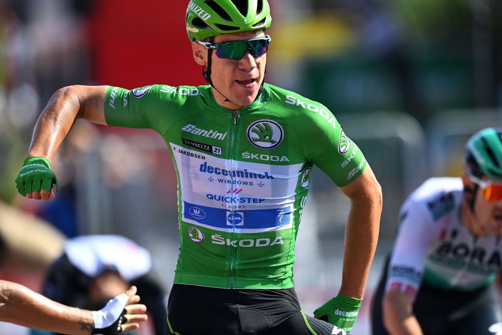 SANTA CRUZ DE BEZANA SPAIN AUGUST 31 Fabio Jakobsen of Netherlands and Team Deceuninck QuickStep Green Points Jersey celebrates at finish line as stage winner during the 76th Tour of Spain 2021 Stage 16 a 180km stage from Laredo to Santa Cruz de Bezana lavuelta LaVuelta21 on August 31 2021 in Santa Cruz de Bezana Spain Photo by Stuart FranklinGetty Images